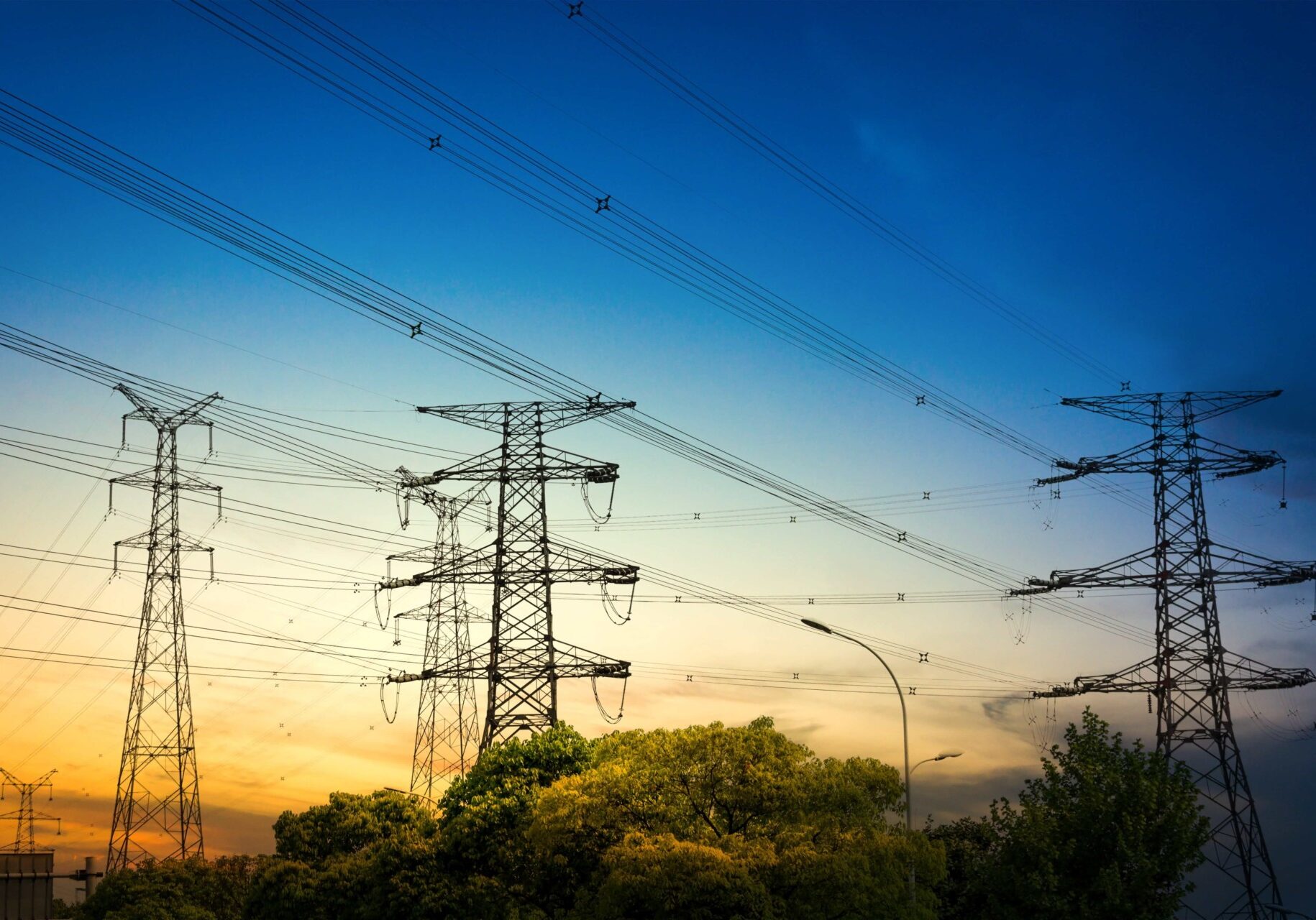 sun-setting-behind-the-silhouette-of-electricity-pylons-min (1) sun-setting-behind-the-silhouette-of-electricity-pylons-min (1)